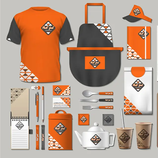Image of graphic design materials, including t-shirts, aprons and utensils, all with a branded visual identity in orange and gray tones.